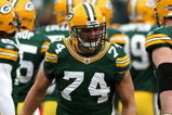 GREEN BAY, WI - NOVEMBER 30:  Aaron Kampman #74 of the Green Bay Packers takes the field during player ingtroductions against the Carolina Panthers at Lambeau Field on November 30, 2008 in Green Bay, Wisconsin. The Panthers won 35-31.  (Photo by Jonathan Daniel/Getty Images)