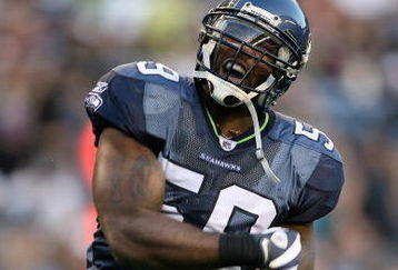 SEATTLE - SEPTEMBER 03:  Linebacker Aaron Curry #59 of the Seattle Seahawks celebrates after sacking the quarterback in the first quarter against the Oakland Raiders on September 3, 2009 at Qwest Field in Seattle, Washington. (Photo by Otto Greule Jr/Getty Images)