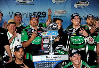 RICHMOND, VA - SEPTEMBER 11:  Carl Edwards, driver of the #60 Scotts Ford, celebrates in victory lane after winning the NASCAR Nationwide Series Virginia 529 College Savings Plan 250 at Richmond International Raceway on September 11, 2009 in Richmond, Virginia.  (Photo by Rusty Jarrett/Getty Images for NASCAR)