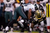 NEW ORLEANS - JANUARY 13:  Sheldon Brown #24 of the Philadelphia Eagles breaks up a pass intended for Reggie Bush #25 of the New Orleans Saints during the NFC divisional playoff game at the Superdome on January 13, 2007 in New Orleans, Louisiana.  (Photo by Ronald Martinez/Getty Images)