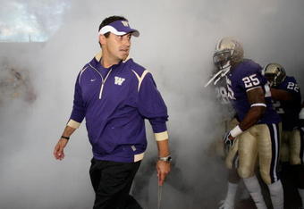 SEATTLE - SEPTEMBER 05:  Head coach Steve Sarkisian of the Washington Huskies leads his team out of the tunnel prior to the game against the LSU Tigers on September 5, 2009 at Husky Stadium in Seattle, Washington. (Photo by Otto Greule Jr/Getty Images)