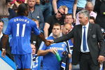 LONDON, ENGLAND - AUGUST 29:  Chelsea manager Carlo Ancelotti shakes the hand of Didier Drogba during the Barclays Premier League match between Chelsea and Burnley at Stamford Bridge on August 29, 2009 in London, England.  (Photo by Phil Cole/Getty Images)