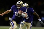 SEATTLE - SEPTEMBER 05:  Quarterback Jake Locker #10 of the Washington Huskies rushes against Rahim Alem #84 the LSU Tigers on September 5, 2009 at Husky Stadium in Seattle, Washington. The Tigers defeated the Huskies 31-23. (Photo by Otto Greule Jr/Getty Images)