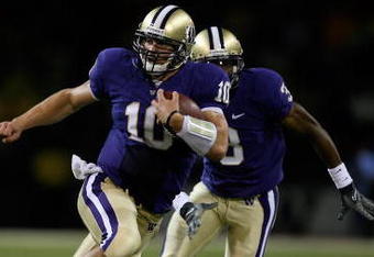 SEATTLE - SEPTEMBER 05:  Quarterback Jake Locker #10 of the Washington Huskies rushes against Rahim Alem #84 the LSU Tigers on September 5, 2009 at Husky Stadium in Seattle, Washington. The Tigers defeated the Huskies 31-23. (Photo by Otto Greule Jr/Getty Images)