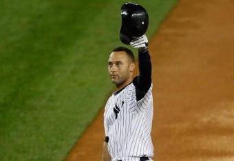 NEW YORK - SEPTEMBER 11: Derek Jeter #2 of the New York Yankees acknowledges the crowd after hitting a single to right field in the third inning during a game against the Baltimore Orioles at Yankee Stadium on September 11, 2009 in the Bronx borough of New York City. Jeter's hit was his 2,722nd, passing Lou Gehrig's all-time club record of 2,721. (Photo by Jared Wickerham/Getty Images)
