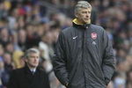 BLACKBURN, UNITED KINGDOM - FEBRUARY 25:  Arsene Wenger the manager of Arsenal look and Mark Hughes the manager of Blackburn Rovers look on during the Barclays Premiership match between Blackburn Rovers and Arsenal at Ewood Park on February 25, 2006 in Blackburn, England.  (Photo by Alex Livesey/Getty Images)