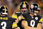 PITTSBURGH - SEPTEMBER 11:  Daniel Sepulveda #9 and Greg Warren #60 of the Pittsburgh Steelers celebrates teammate Jeff Reed's game winning field goal in overtime against the Tennessee Titans on September 11, 2009 at Heinz Field in Pittsburgh, Pennsylvania. The Steelers defeated the Titans 13-10 in overtime.  (Photo by Elsa/Getty Images)