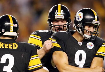 PITTSBURGH - SEPTEMBER 11:  Daniel Sepulveda #9 and Greg Warren #60 of the Pittsburgh Steelers celebrates teammate Jeff Reed's game winning field goal in overtime against the Tennessee Titans on September 11, 2009 at Heinz Field in Pittsburgh, Pennsylvania. The Steelers defeated the Titans 13-10 in overtime.  (Photo by Elsa/Getty Images)