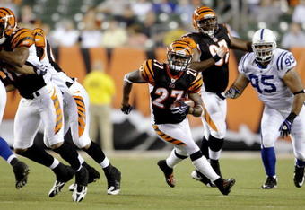 CINCINNATI, OH - AUGUST 3:  DeDe Dorsey #27 of the Cincinnati Bengals rushes as he is followed by Fili Moala #95 of the Indianapolis Colts during the preseason game on August 3, 2009 at Paul Brown Stadium in Cincinnati, Ohio.  (Photo by Andy Lyons/Getty Images)