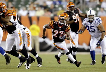 CINCINNATI, OH - AUGUST 3:  DeDe Dorsey #27 of the Cincinnati Bengals rushes as he is followed by Fili Moala #95 of the Indianapolis Colts during the preseason game on August 3, 2009 at Paul Brown Stadium in Cincinnati, Ohio.  (Photo by Andy Lyons/Getty Images)