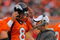 DENVER - AUGUST 30:  Head coach Josh McDaniels of the Denver Broncos talks with quarterback Kyle Orton #8 on the sidelines as they face the Chicago Bears during preseason NFL action at INVESCO Field at Mile High on August 30, 2009 in Denver, Colorado. The Bears defeated the Broncos 27-17.  (Photo by Doug Pensinger/Getty Images)
