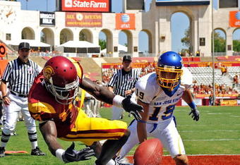 LOS ANGELES, CA - SEPTEMBER 05:  Damian Williams #18 of the USC Trojans drops the ball while falling out of the end zone after Peyton Thompson #19 of the San Jose State Spartans broke up the pass during the second quarter at Los Angeles Memorial Coliseum on September 5, 2009 in Los Angeles, California.  (Photo by Kevork Djansezian/Getty Images)