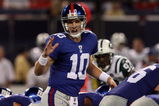 EAST RUTHERFORD, NJ - AUGUST 29:  Eli Manning #10 of the New York Giants calls a play against the New York Jets on August 29, 2009 at Giants Stadium in East Rutherford, New Jersey.  (Photo by Jim McIsaac/Getty Images)