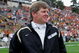 BOULDER, CO - OCTOBER 04:  Head coach Dan Hawkins (L) of the Colorado Buffaloes and head coach Mack Brown (R) of the Texas Longhorns chat as their teams warm up prior to their game at Folsom Field on October 4, 2008 in Boulder, Colorado.  (Photo by Doug Pensinger/Getty Images)