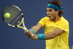 NEW YORK - SEPTEMBER 10:  Rafael Nadal of Spain returns a shot to Fernando Gonzalez of Chile during the Men's Singles Quarterfinals match on day eleven of the 2009 U.S. Open at the USTA Billie Jean King National Tennis Center on September 10, 2009 in the Flushing neighborhood of the Queens borough of New York City.  (Photo by Nick Laham/Getty Images)