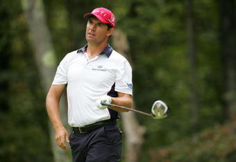 NORTON, MA - SEPTEMBER 07:  Padraig Harrington reacts to his errant drive on the second hole during the final round of the Deutsche Bank Championship at TPC Boston held on September 7, 2009 in Norton, Massachusetts.  (Photo by Michael Cohen/Getty Images)