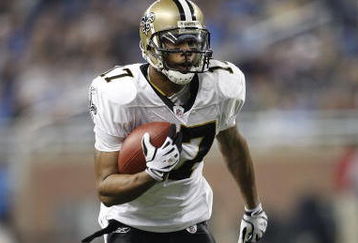 DETROIT - DECEMBER 21: Wide receiver Robert Meachem #17 of the New Orleans Saints scores a first quarter touchdown on a 20 yard run against the Detroit Lions on December 21, 2008 at Ford Field in Detroit, Michigan. (Photo by Leon Halip/Getty Images)