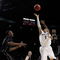 PORTLAND, OR - MARCH 21:  Venoy Overton #1 of the Washington Huskies goes up for a shot against Keaton Grant #5 of the Purdue Boilermakers in the first half during the second round of the NCAA Division I Men's Basketball Tournament at the Rose Garden on March 21, 2009 in Portland, Oregon.  (Photo by Jonathan Ferrey/Getty Images)