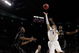 PORTLAND, OR - MARCH 21:  Venoy Overton #1 of the Washington Huskies goes up for a shot against Keaton Grant #5 of the Purdue Boilermakers in the first half during the second round of the NCAA Division I Men's Basketball Tournament at the Rose Garden on March 21, 2009 in Portland, Oregon.  (Photo by Jonathan Ferrey/Getty Images)