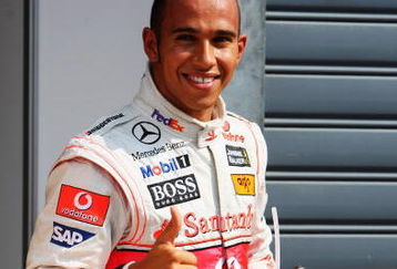 MONZA, ITALY - SEPTEMBER 12:  Lewis Hamilton of Great Britain and McLaren Mercedes celebrates in parc ferme after taking pole position during qualifying for the Italian Formula One Grand Prix at the Autodromo Nazionale di Monza on September 12, 2009 in Monza, Italy.  (Photo by Mark Thompson/Getty Images)