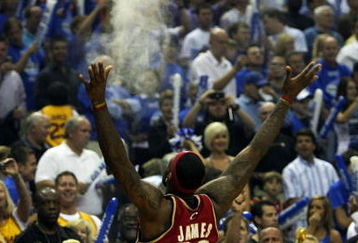 ORLANDO, FL - MAY 24:  LeBron James #23 of the Cleveland Cavaliers throws chalk in the air before the game against the Orlando Magic in Game Three of the Eastern Conference Finals during the 2009 NBA Playoffs at the the Amway Arena on May 24, 2009 in Orlando, Florida. NOTE TO USER: User expressly acknowledges and agrees that, by downloading and or using this photograph, User is consenting to the terms and conditions of the Getty Images License Agreement.  (Photo by Elsa/Getty Images)