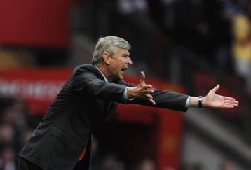 MANCHESTER, ENGLAND - AUGUST 29:  Arsenal Manager Arsene Wenger reacts during the Barclays Premier League match between Manchester United and Arsenal at Old Trafford on August 29, 2009 in Manchester, England.  (Photo by Laurence Griffiths/Getty Images)