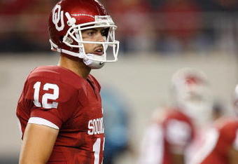 ARLINGTON, TX - SEPTEMBER 05:  Quarterback Landry Jones #12 of the Oklahoma Sooners at Cowboys Stadium on September 5, 2009 in Arlington, Texas.  (Photo by Ronald Martinez/Getty Images)