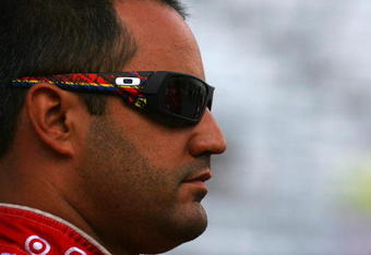 BRISTOL, TN - AUGUST 21: Juan Pablo Montoya, driver of the #42 Target Chevolet, stands on the grid during qualifying for the NASCAR Sprint Cup Series Sharpie 500 at Bristol Motor Speedway on August 21, 2009 in Bristol, Tennessee.  (Photo by Jason Smith/Getty Images for NASCAR)