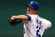 KANSAS CITY, MO - JUNE 17:  Starting pitcher Zack Greinke #23 of the Kansas City Royals pitches just prior to the start of the game against  the Arizona Diamondbacks on June 17, 2009 at Kauffman Stadium in Kansas City, Missouri.  (Photo by Jamie Squire/Getty Images)