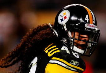 PITTSBURGH - SEPTEMBER 10:  Troy Polamalu #43 of the Pittsburgh Steelers runs with the ball against the Tennessee Titans during the game at Heinz Field on September 10, 2009 in Pittsburgh, Pennsylvania. (Photo by Scott Boehm/Getty Images)