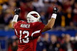 TAMPA, FL - FEBRUARY 01:  Kurt Warner #13 of the Arizona Cardinals celebrates after he threw a 64-yard touchdown to Larry Fitzgerald #11 in the fourth quarter against the Pittsburgh Steelers during Super Bowl XLIII on February 1, 2009 at Raymond James Stadium in Tampa, Florida. The Steelers won 27-23.  (Photo by Chris Graythen/Getty Images)