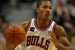 CHICAGO - MARCH 06:  Derrick Rose #1 of the Chicago Bulls brings the ball up court against the Milwaukee Bucks at the United Center on March 6, 2009 in Chicago, Illinois.  NOTE TO USER: User expressly acknowledges and agreees that, by downloading and/or using this Photograph, User is consenting to the terms and conditions of the Getty Images License Agreement.  (Photo by Jonathan Daniel/Getty Images)