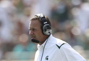 EAST LANSING, MI - SEPTEMBER 05:  Michigan State Spartans head coach Mark Dantonio watches the action during the game against the Montana State Bobcats on September 5, 2009 at Spartan Stadium in East Lansing, Michigan.  (Photo by Leon Halip/Getty Images)