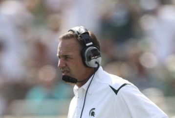 EAST LANSING, MI - SEPTEMBER 05:  Michigan State Spartans head coach Mark Dantonio watches the action during the game against the Montana State Bobcats on September 5, 2009 at Spartan Stadium in East Lansing, Michigan.  (Photo by Leon Halip/Getty Images)