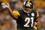PITTSBURGH - SEPTEMBER 11:  Mewelde Moore #21 of the Pittsburgh Steelers celebrates his first down in the fourth quarter against the Tennessee Titans on September 11, 2009 at Heinz Field in Pittsburgh, Pennsylvania. The Steelers defeated the Titans 13-10 in overtime.  (Photo by Elsa/Getty Images)