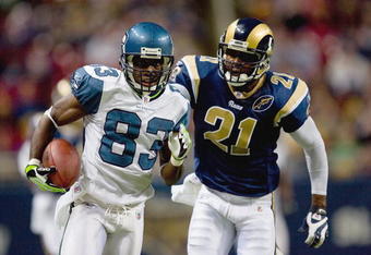 ST. LOUIS, MO - DECEMBER 14:  Deion Branch #83 of the Seattle Seahawks carries the ball against Oshiomogho Atogwe #21 of the St. Louis Rams at the Edward Jones Dome on December 14, 2008 in St. Louis, Missouri.    (Photo by: Dilip Vishwanat/Getty Images)