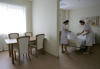 BEIJING, CHINA - JULY 7: (CHINA OUT) Nurses arrange a dedicated ward for athletes of the 2008 Beijing Olympics in the China-Japan Friendship Hospital on July 7, 2008 in Beijing, China. All of the 24 Olympic-appointed hospitals will be put into operation on July 20 for the upcoming Games. (Photo by China Photos/Getty Images)