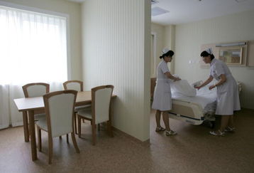 BEIJING, CHINA - JULY 7: (CHINA OUT) Nurses arrange a dedicated ward for athletes of the 2008 Beijing Olympics in the China-Japan Friendship Hospital on July 7, 2008 in Beijing, China. All of the 24 Olympic-appointed hospitals will be put into operation on July 20 for the upcoming Games. (Photo by China Photos/Getty Images)