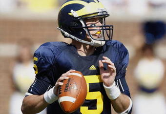 ANN ARBOR, MI - SEPTEMBER 05:  Tate Forcier #5 of the Michigan Wolverines gets ready to throw a second quarter pass while playing the Western Michigan Broncos on September 5, 2009 at Michigan Stadium in Ann Arbor, Michigan.  (Photo by Gregory Shamus/Getty Images)