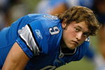 DETROIT, MI - AUGUST 15: Quarterback Matthew Stafford #9 of the Detroit Lions stretches in warm ups prior to the game against the Atlanta Falcons at Ford Field on August 15, 2009 in Detroit, Michigan. (Photo by Scott Boehm/Getty Images)