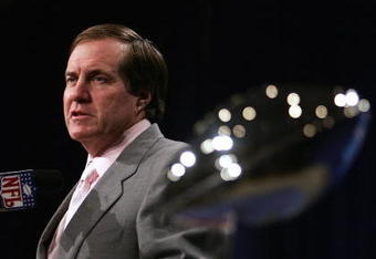 JACKSONVILLE, FL - FEBRUARY 4:  Bill Belichick, head coach of the New England Patriots, speaks in front of the Vince Lombardi trophy at a pre Superbowl press conference February 4, 2005 at the Prime F. Osborn Convention Center in Jacksonville, Florida.  (Photo by Al Bello/Getty Images)