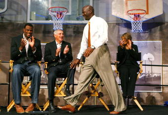 SPRINGFIELD, MA - SEPTEMBER 11:  Michael Jordan prepares to be presented with his Hall of Fame jacket at the Naismith Memorial Basketball Hall of Fame on September 11, 2009 in Springfield, Massachusetts. (Photo by Jim Rogash/Getty Images)