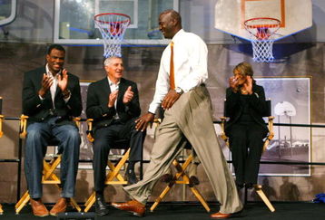 SPRINGFIELD, MA - SEPTEMBER 11:  Michael Jordan prepares to be presented with his Hall of Fame jacket at the Naismith Memorial Basketball Hall of Fame on September 11, 2009 in Springfield, Massachusetts. (Photo by Jim Rogash/Getty Images)