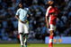 MANCHESTER, ENGLAND - SEPTEMBER 12:  Emmanuel Adebayor of Manchester and William Gallas of Arsenal prepare for the Barclays Premier League match between Manchester City and Arsenal at the City of Manchester Stadium on September 12, 2009 in Manchester, England.  (Photo by Shaun Botterill/Getty Images)