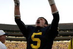 ANN ARBOR, MI - SEPTEMBER 12:  Quarterback Tate Forcier #5 celebrates with seconds left in the game against Notre Dame at Michigan Stadium on September 12, 2009 in Ann Arbor, Michigan.  (Photo by Domenic Centofanti/Getty Images)