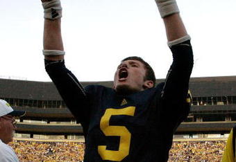 ANN ARBOR, MI - SEPTEMBER 12:  Quarterback Tate Forcier #5 celebrates with seconds left in the game against Notre Dame at Michigan Stadium on September 12, 2009 in Ann Arbor, Michigan.  (Photo by Domenic Centofanti/Getty Images)