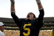 ANN ARBOR, MI - SEPTEMBER 12:  Quarterback Tate Forcier #5 celebrates with seconds left in the game against Notre Dame at Michigan Stadium on September 12, 2009 in Ann Arbor, Michigan.  (Photo by Domenic Centofanti/Getty Images)