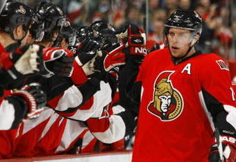 OTTAWA - FEBRUARY 26:  Dany Heatley #15 and Mike Fisher #12 of the Ottawa Senators celebrate a goal against the San Jose Sharks in a game on February 26, 2009 at the Scotiabank Place in Ottawa, Canada. (Photo by Phillip MacCallum/Getty Images)