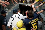 ANN ARBOR, MI - SEPTEMBER 12:  Quarterback Tate Forcier #5 and Michigan head coach Rich Rodriguez give high-fives as they leave the field after beating Notre Dame 38-34 at Michigan Stadium on September 12, 2009 in Ann Arbor, Michigan.  (Photo by Domenic Centofanti/Getty Images)