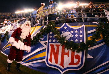 SAN DIEGO - DECEMBER 24:  Santa Claus walks on the sidelines during the San Diego Chargers NFL game against the Denver Broncos at Qualcomm Stadium December 24, 2007 in San Diego, California.  (Photo by Donald Miralle/Getty Images)